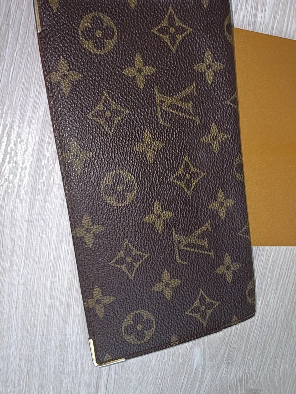 1984 Louis Vuitton authenticated long checkbook wallet